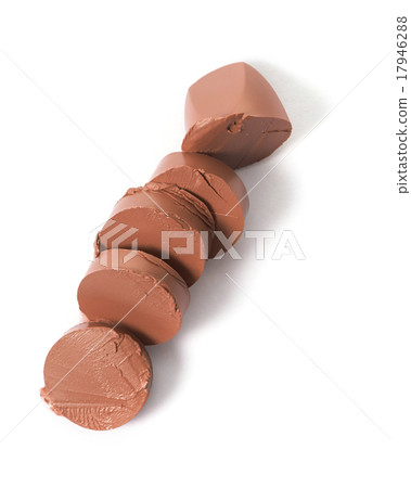 Brown color lipstick cut on background 17946288