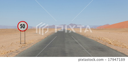 Speed limit sign at a desert road in Namibia Speed limit sign at a desert road in Namibia 17947189