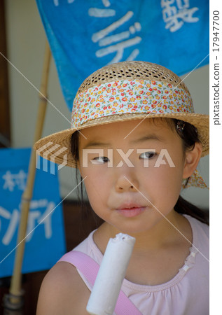 A girl who eats ice candy 17947700