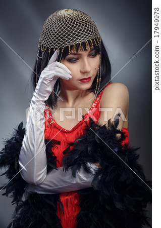 Elegant woman in the red dress and necklet. 17949978