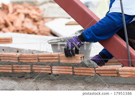 Bricklayer working in construction Bricklayer working in construction 17951386