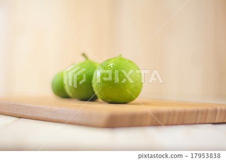 Three lemons on wooden cutting boards. Three lemons on wooden cutting boards. 17953838