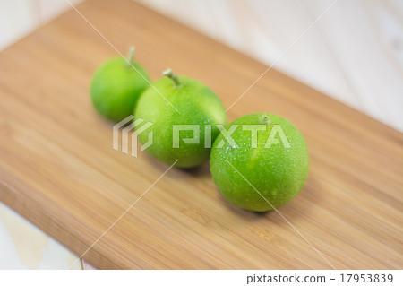 Three lemons on wooden cutting boards. Three lemons on wooden cutting boards. 17953839