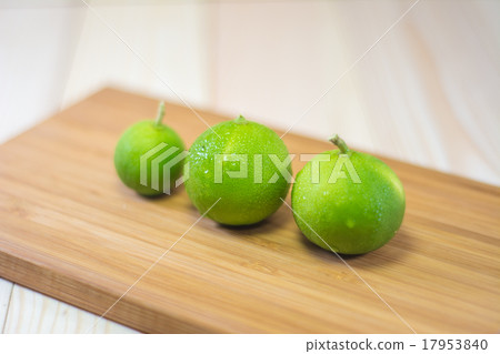Three lemons on wooden cutting boards. Three lemons on wooden cutting boards. 17953840