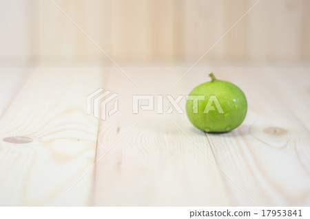 lemon on wooden table. lemon on wooden table. 17953841