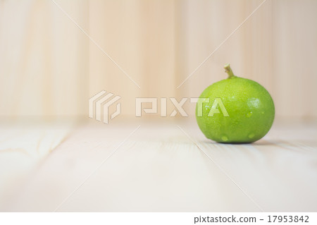 lemon on wooden table. lemon on wooden table. 17953842
