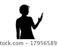 A woman using a cell phone 17956589