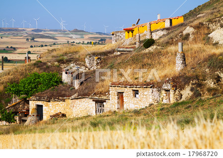 Village with dwellings houses-caves built into rock. Palenzuela Village with dwellings houses-caves built into rock. Palenzuela 17968720