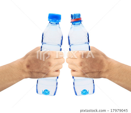 Human hands holding bottles of water isolated Human hands holding bottles of water isolated 17979045