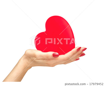 Red heart in woman hand isolated on white Red heart in woman hand isolated on white 17979452
