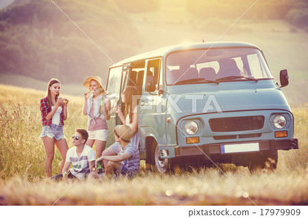 Stock Photo: Young hipster friends on road trip