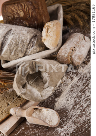 Freshly baked bread on the wooden Freshly baked bread on the wooden 17981169