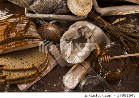 Baked bread on wood table Baked bread on wood table 17981645
