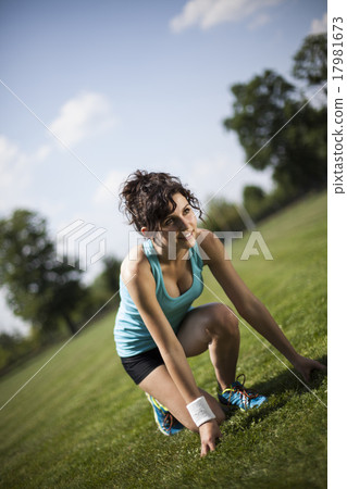 Runner feet running on road closeup on shoe 17981673