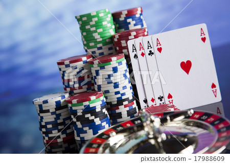 Poker Chips on a gaming with casino roulette Poker Chips on a gaming with casino roulette 17988609