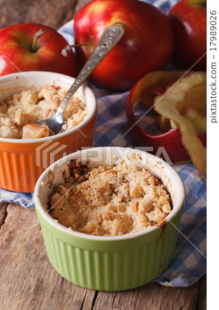 English crumble with apples close-up in the pot 17989026