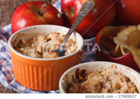 English crumble with apples close-up in the pot 17989027