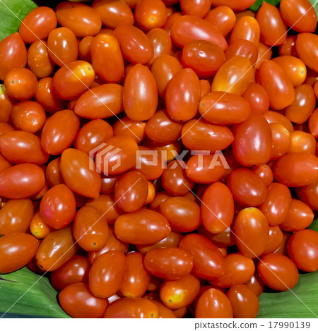 Group of fresh small tomatoes 17990139