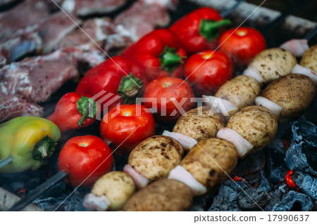 Meat and vegetables are roasted on coals Meat and vegetables are roasted on coals 17990637
