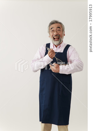 有頰須和球的老人在圍裙 17995913