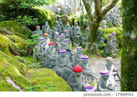 Stairs and statues of small buddha in Japan 17999561