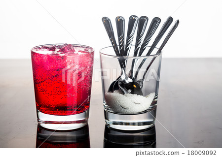 Concept of red fizzy drinks with unhealthy sugar 18009092