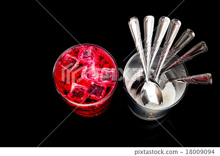 Concept of red fizzy drinks with unhealthy sugar  18009094