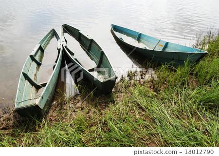 three wooden boats 18012790
