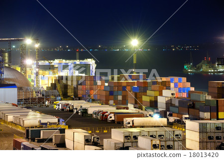Port warehouse with cargoes and containers 18013420