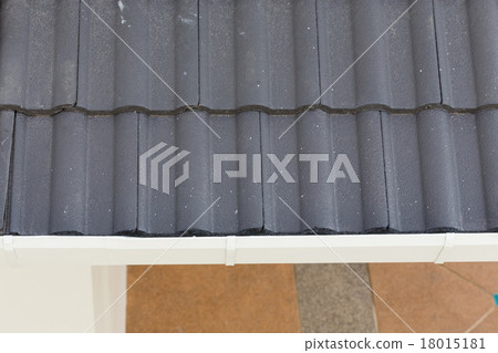 white gutter on the roof top of house white gutter on the roof top of house 18015181