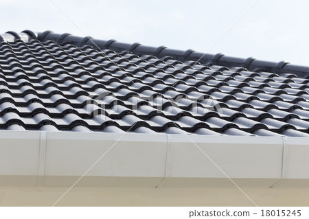 white gutter on the roof top of house white gutter on the roof top of house 18015245
