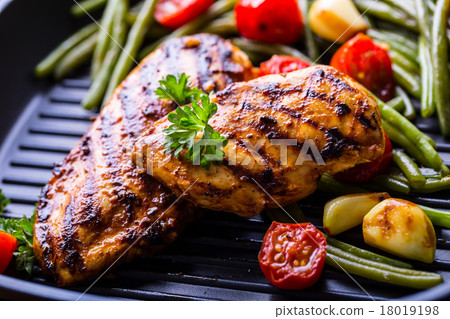 Grilled chicken breast in different variations 18019198