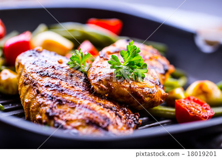 Grilled chicken breast in different variations 18019201