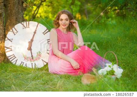 Beautiful girl with a rabbit in the hands  18026587