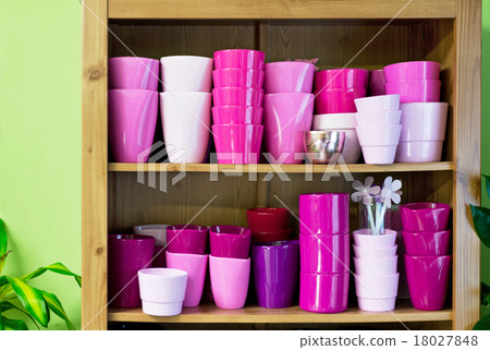 flowerpots in a shelf in a market flowerpots in a shelf in a market 18027848