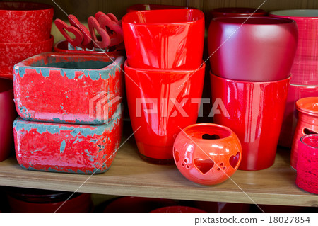 red flowerpots in the florist store red flowerpots in the florist store 18027854
