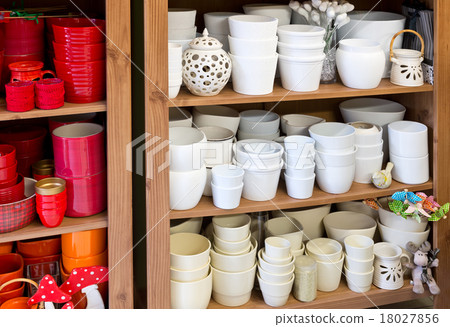 white planters in the florist shop white planters in the florist shop 18027856