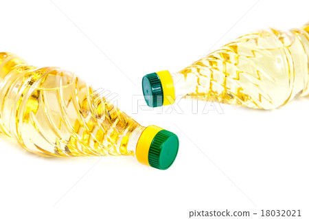 Bottle with vegetable oil on white background. Bottle with vegetable oil on white background. 18032021