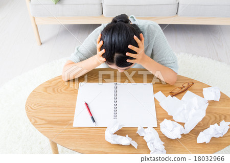 A notebook worn by a woman who writes something and a ballpoint pen jammed paper living sofa A notebook worn by a woman who writes something and a ballpoint pen jammed paper living sofa 18032966