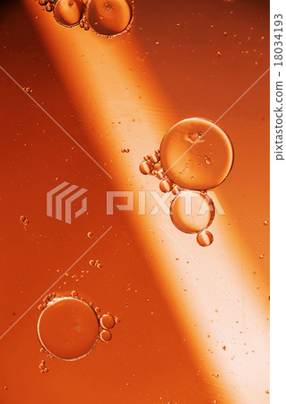 Oil drops on a water surface Oil drops on a water surface 18034193
