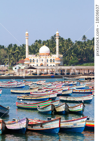 Fishing harbor with colorful boats and mosque 18036637