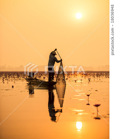 Fisherman of Lake in action when fishing Fisherman of Lake in action when fishing 18036948