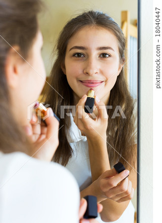 young girl admiring himself young girl admiring himself 18040447