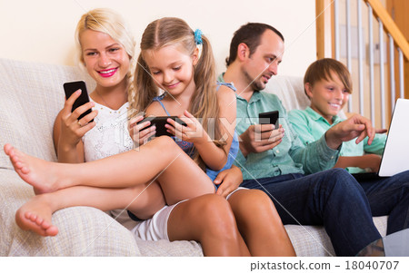Family working with smartphones 18040707
