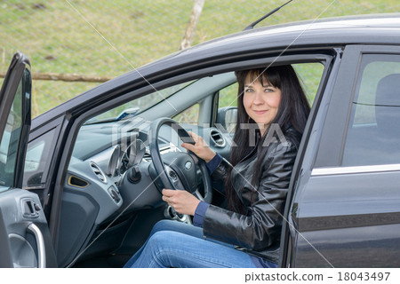 Girl in the car 18043497