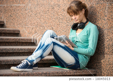 Beautiful young woman student with note pad and Beautiful young woman student with note pad and 18045013