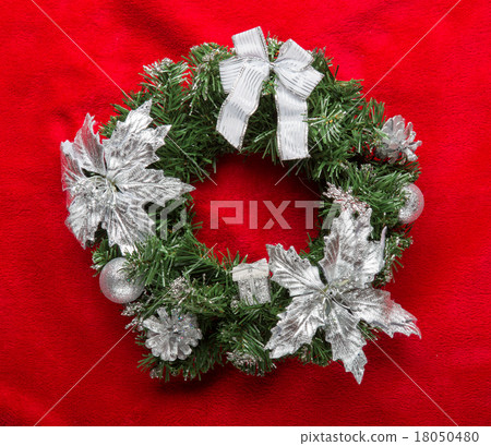 Christmas wreath with baubles on a red Christmas wreath with baubles on a red 18050480