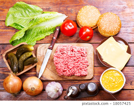 Raw beef for hamburger with vegetables Raw beef for hamburger with vegetables 18057425