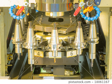 CNC machining center tool change magazine close up CNC machining center tool change magazine close up 18061167