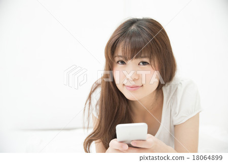 Smartphone (bed) in room wear Smartphone (bed) in room wear 18064899